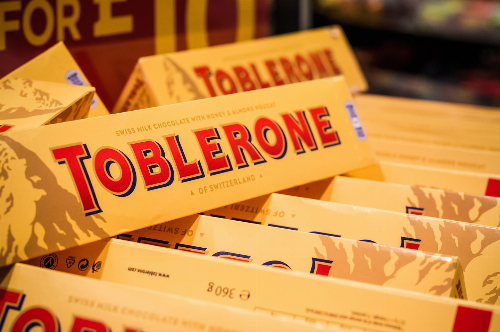 Toblerone to use “streamlined” logo after it loses iconic Swiss mountain
